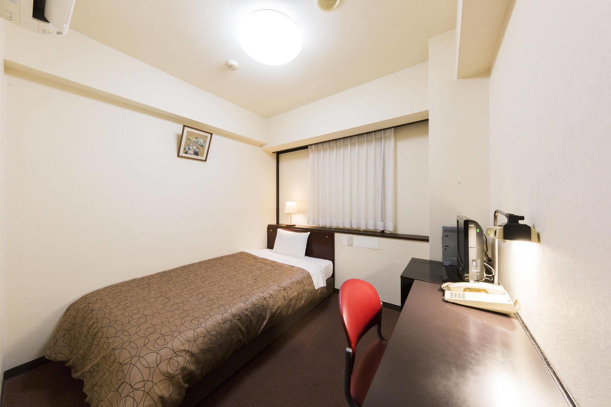 Dai-Ni Sunny Stone Hotel Suita Exterior foto